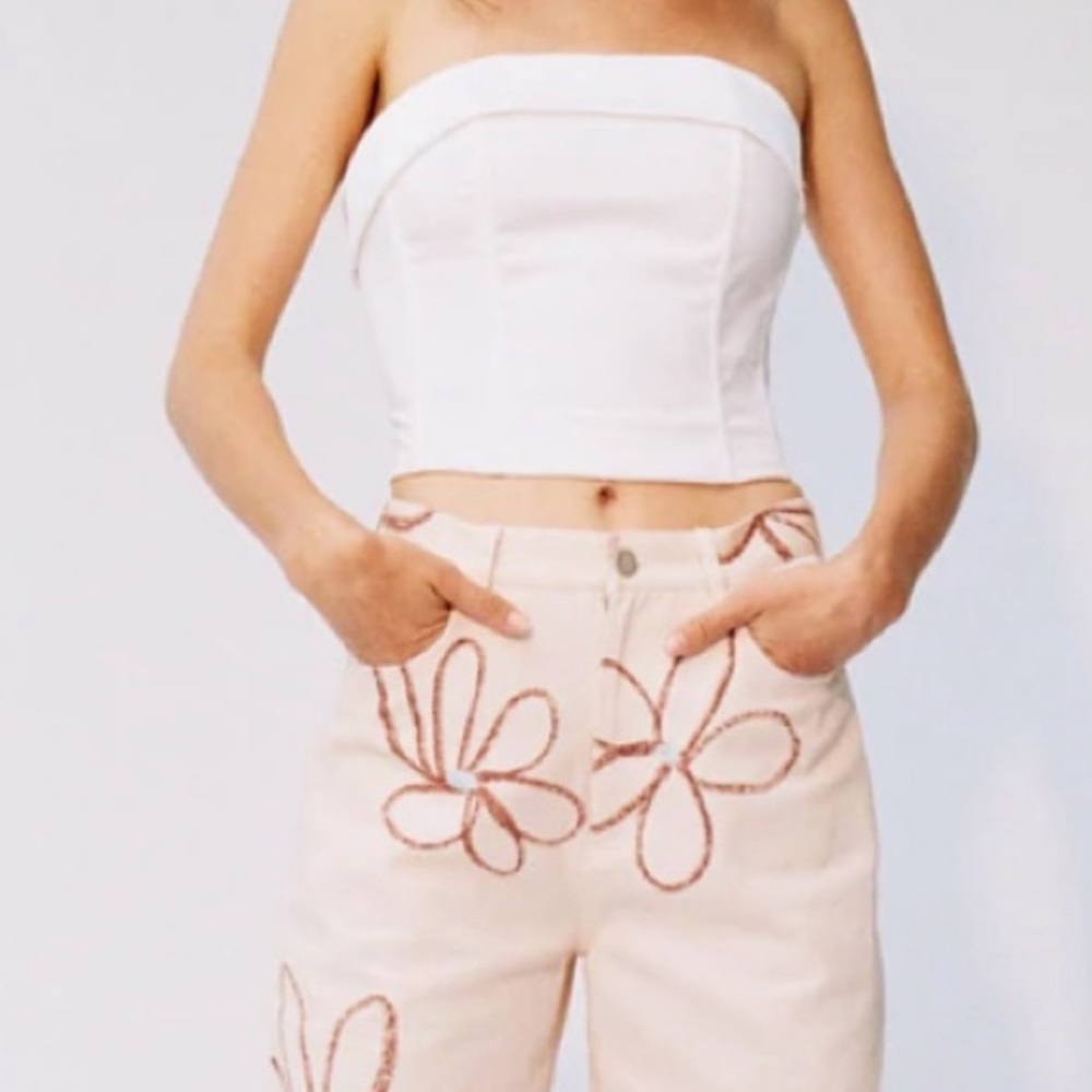 With Jean Carla white corset top